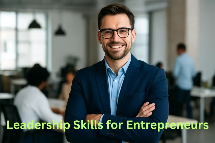 A confident businessman standing in a modern office environment, symbolizing strong leadership and entrepreneurial success, used as a banner image for an article about leadership skills for entrepreneurs.