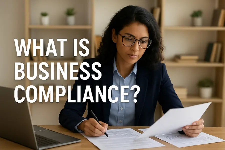 Compliance Tips in Business - A professional businesswoman reviewing compliance documents at her desk with the text “What is Business Compliance?” displayed, symbolizing business regulations and corporate responsibility.